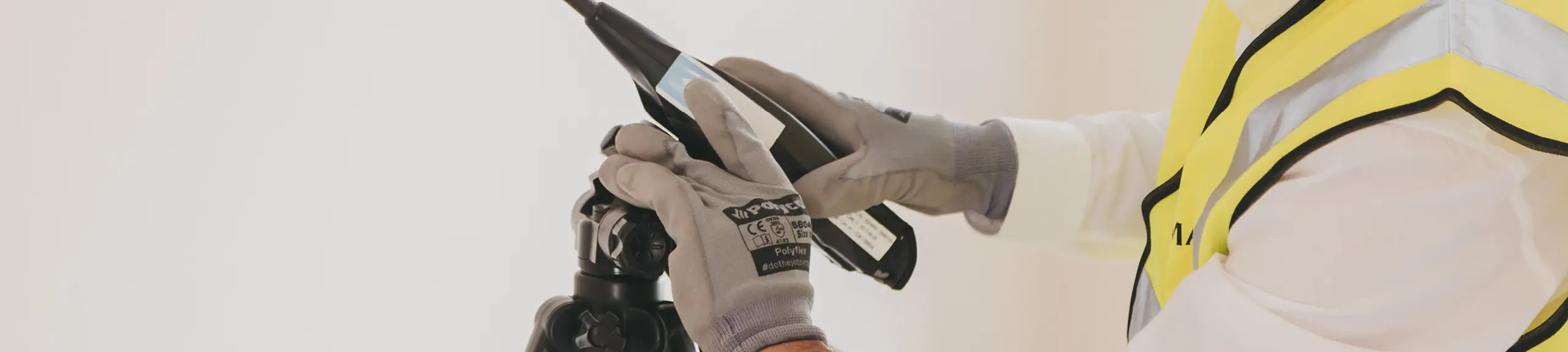 a man with an air tightness testing gauge  a man with an air tightness testing gauge